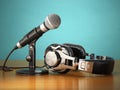 Microphone and headphones. Audio recording or radio commentator Royalty Free Stock Photo