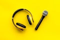 Microphone, Headphones For Blogger, Journalist Or Musician Work On Yellow Background Top View