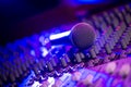 Microphone and Headphones on dirty sound mixer panel Royalty Free Stock Photo