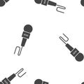 Microphone icon with a news symbol seamless pattern on a white background Royalty Free Stock Photo
