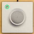 Microphone icon switch, and loudspeaker on wood background for c