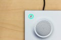 Microphone icon switch, and loudspeaker on wood background for c