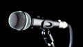 Microphone, mic, karaoke, concert, voice music. Vocal audio mic on a bleck background. Singer in karaokes, microphones