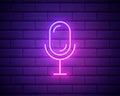 Microphone neon icon. Mic on brick wall background. Studio record concept. Vector illustration can be used for neon Royalty Free Stock Photo