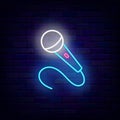 Microphone neon icon. Stand up comedy show. Music talent show. Vector stock illustration