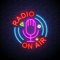 Microphone neon light icon. Radio broadcasting. On air glowing sign. Vector isolated illustration. Royalty Free Stock Photo