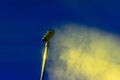 Microphone in nighttime outdoor concert, artificial lighting in Central America, Guatemala.