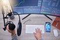 Microphone, person hands and podcast studio, computer screen and stock market news, radio or audio update. Mic, sound Royalty Free Stock Photo
