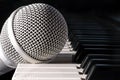 Microphone and piano keyboard Royalty Free Stock Photo
