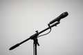 Microphone placed on stand with white background in a conference room Royalty Free Stock Photo