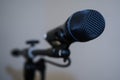 Microphone placed on stand with white background in a conference room Royalty Free Stock Photo