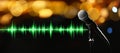 Microphone and radio wave on background, bokeh effect. Banner design