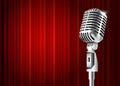 Microphone and red curtain Royalty Free Stock Photo