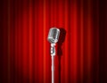 Microphone and red curtain Royalty Free Stock Photo