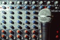 The microphone lies on the mixer Royalty Free Stock Photo