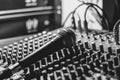 The microphone lies on the mixer Royalty Free Stock Photo