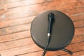 Microphone on a round black chair