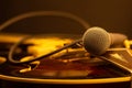 Microphone on semi acoustic guitar. Selective focus Royalty Free Stock Photo