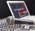 Microphone on sound mixing console Royalty Free Stock Photo