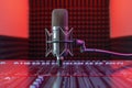 Microphone and sound wave on magenta studio background podcast concept Royalty Free Stock Photo