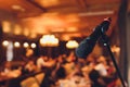 Microphone on stage against a background of auditorium. Royalty Free Stock Photo