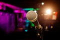 Microphone on stage against a background of auditorium Royalty Free Stock Photo