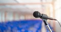 Microphone on stage against a background of auditorium Royalty Free Stock Photo