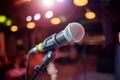 Microphone on stage against a background of auditorium Royalty Free Stock Photo