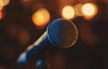 A microphone is on a stand in front of an empty auditorium Royalty Free Stock Photo