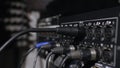 Microphone on a stand located in a music studio recording booth under low key light Royalty Free Stock Photo