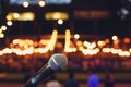 microphone on a stand up comedy stage with colorful bokeh , high contrast image. Royalty Free Stock Photo