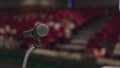 Microphone on the table in conference hall or seminar Royalty Free Stock Photo