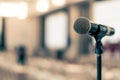 Microphone voice speaker in business seminar, speech presentation, town hall meeting, lecture hall or conference room in corporate Royalty Free Stock Photo