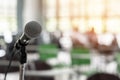 Microphone voice speaker in business seminar, speech presentation, town hall meeting, lecture hall or conference room Royalty Free Stock Photo