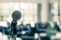 Microphone voice speaker in business seminar, speech presentation, town hall meeting, lecture hall or conference room