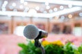 Microphones on abstract blurred of speech in seminar room, speaking conference hall light for presentation in exhibition event Royalty Free Stock Photo