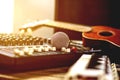 Microphones with audio mixer, sound recorder and old instrument Royalty Free Stock Photo