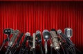 Microphones in Front of Red Curtain Royalty Free Stock Photo