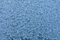 Microphotography of frozen snowflakes on the ice perfect for using as a winter background