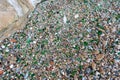 Microplastics on Sand Beach. Micro Plastics Garbage, Tiny Trash Pieces, Microplastic Waste, Dirty Shore Royalty Free Stock Photo