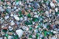 Microplastics on Sand Beach. Micro Plastics Garbage, Tiny Trash Pieces, Microplastic Waste, Dirty Shore Royalty Free Stock Photo