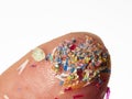 Microplastics in water - polluted water - macro photography of finger with microplatics Royalty Free Stock Photo