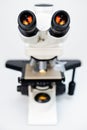 Microscope against a white background