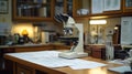 A microscope on a desk with a lamp, papers, and other equipment in the background Royalty Free Stock Photo