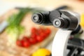 Microscope head on kitchen background Royalty Free Stock Photo