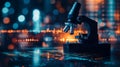 A microscope illuminated by red light is set against a backdrop of data and graphs to facilitate scientific research and discovery Royalty Free Stock Photo