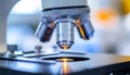 Microscope with Illuminated Sample in Laboratory Setting Royalty Free Stock Photo