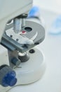 Microscope, laboratory and equipment for research testing, blood for biochemical experiment. Biotechnology, breakthrough