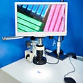 Microscope with camcorder and monitor Royalty Free Stock Photo