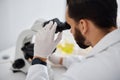Microscope, medical and research with a man at work in a laboratory for science, innovation or development. Doctor Royalty Free Stock Photo